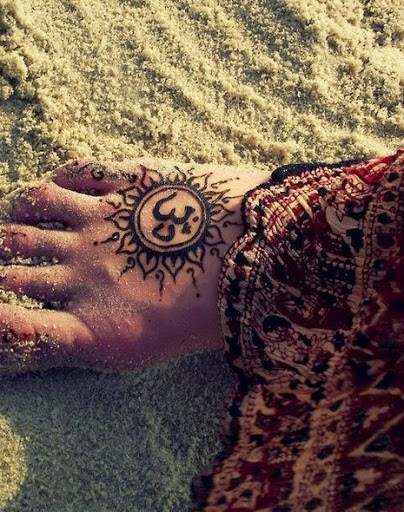 Archaic Tribal Sun Tattoo idea for girl 