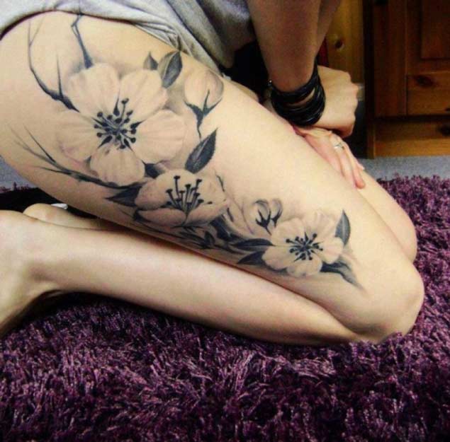 cherry blossom tree tattoo on thigh