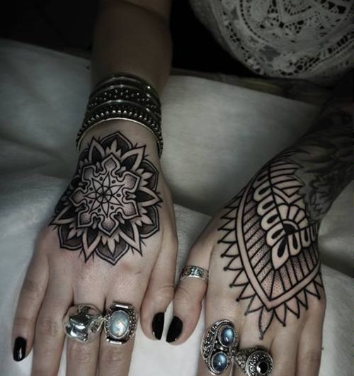 elaborate geometry hand tattoos for girls