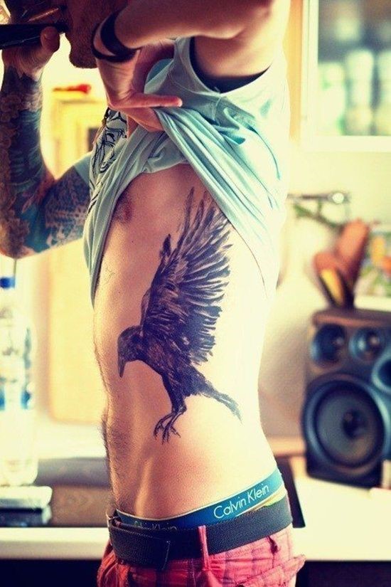 flying bird side tattoos for men