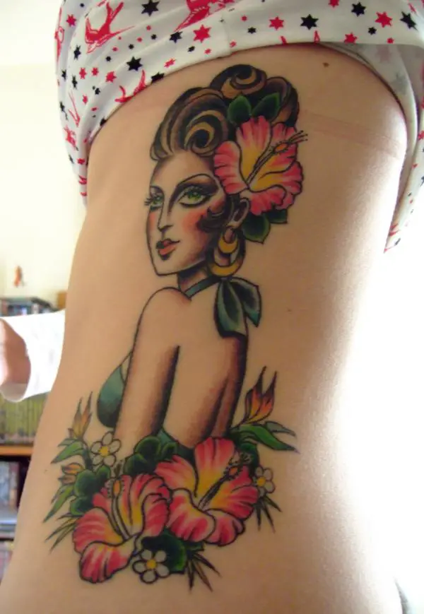 Mischievous with Flowers nice tattoo idea for girl