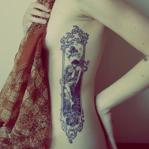 Nice side tattoo idea for girl