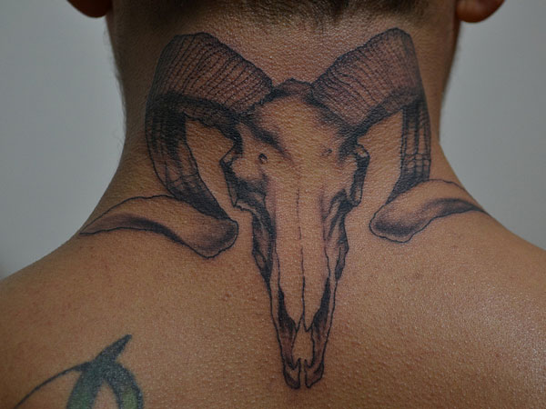 the horned ram neck tattoos