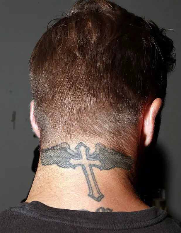  crucifix with wings back of neck