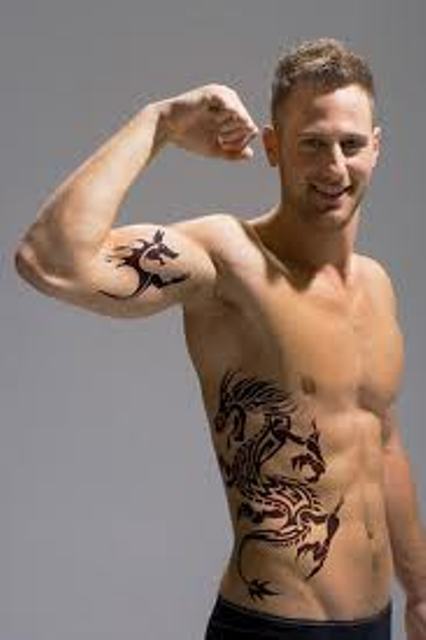 The Power Of Dragon bicep tattoos for men