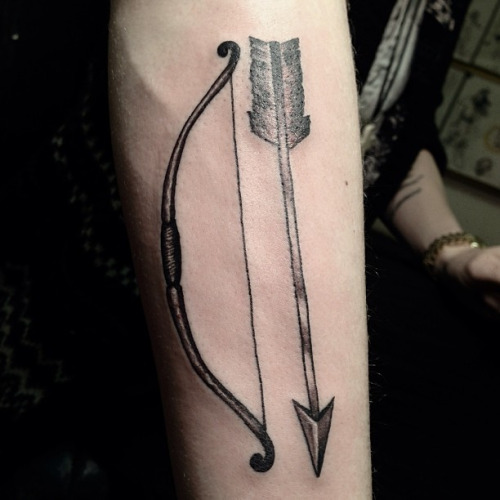 arrow beside the bow tattoo