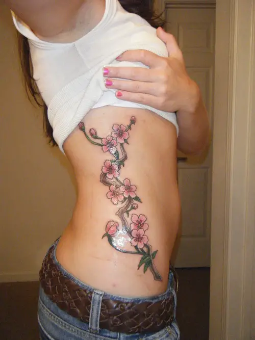 floral rib tattoo for girls