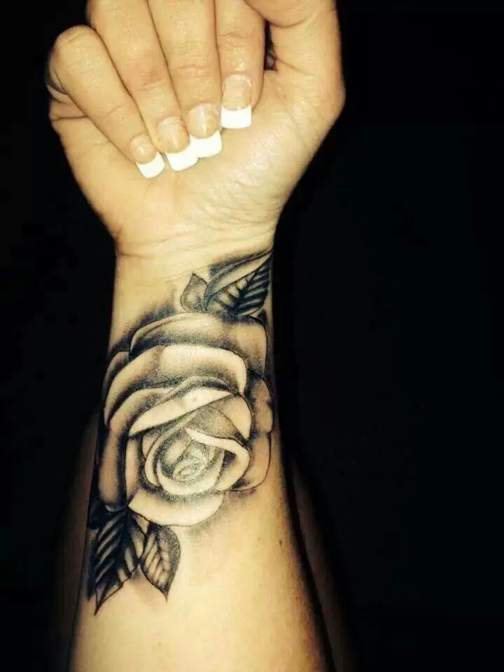 rose forearm tattoos for women