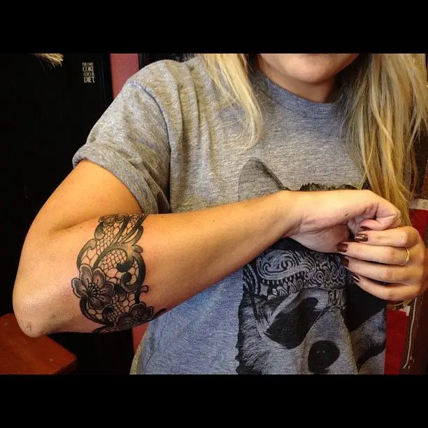 lacework on forearm tattoos