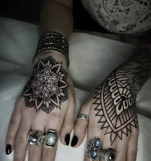 elaborate geometry hand tattoos for girls