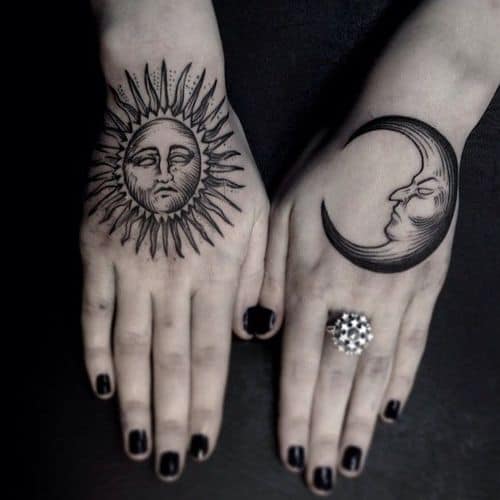 celestial pair hand tattoos for girls