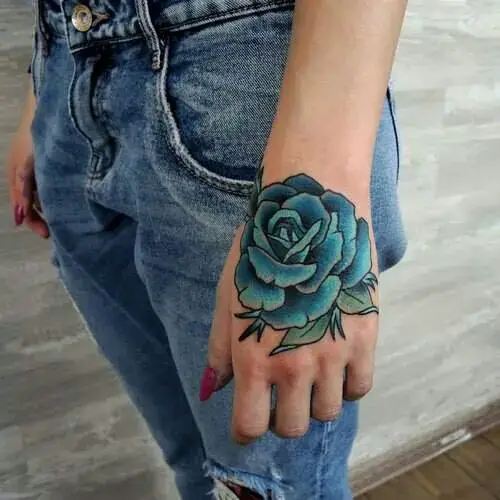 Pretty Pink Rose Hand Tattoo