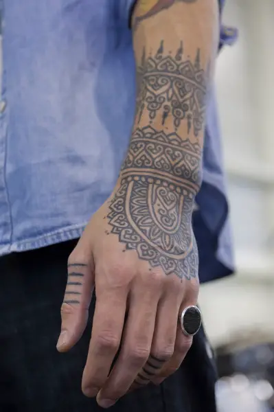 tribal hand tattoos for men