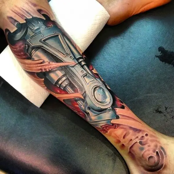  metal man leg tattoos