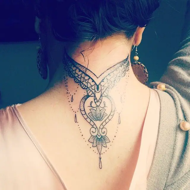 dangling jewelry back neck tattoos for women