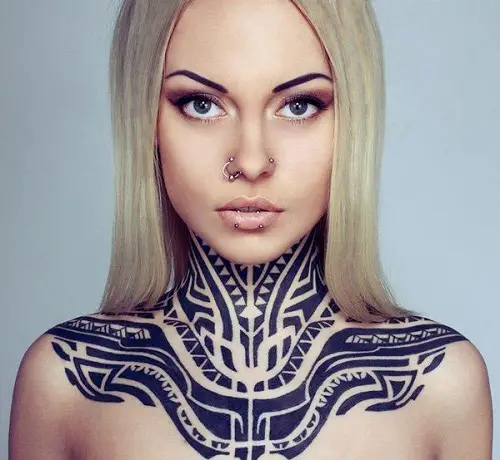 tribal pattern neck and shoulder tattoo