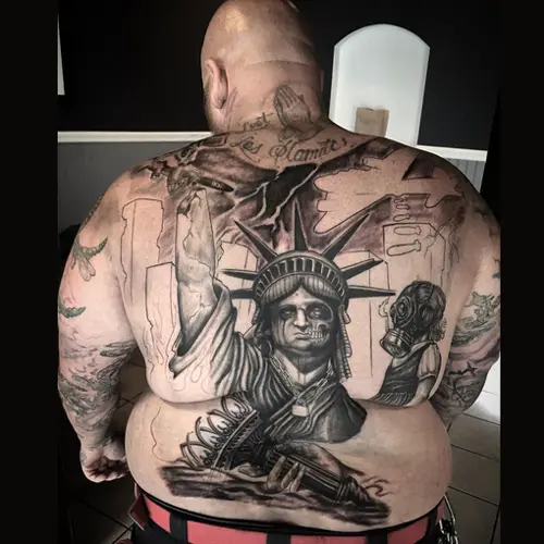 statue of liberty tattoo on back