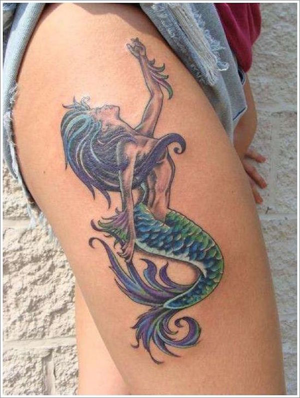 the mermaid tattoos on thigh for women