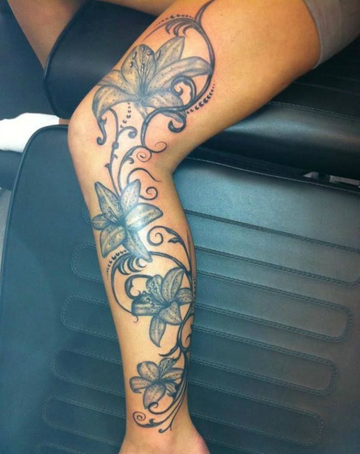 daffodil vine thigh tattoos for women