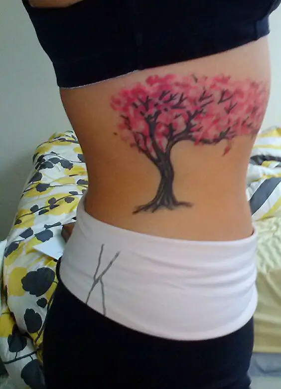 cherry blossom rib cage tattoo