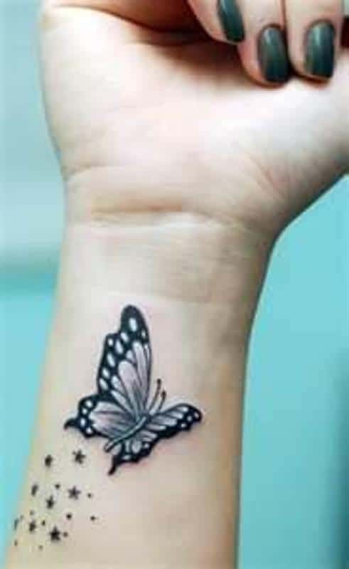 butterfly and stars on wrist 