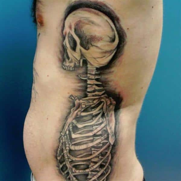 Creepy Imagination tattoo on ribs
