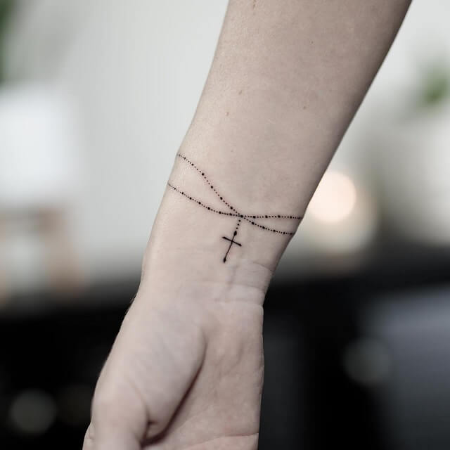 cross tattoos on wrist