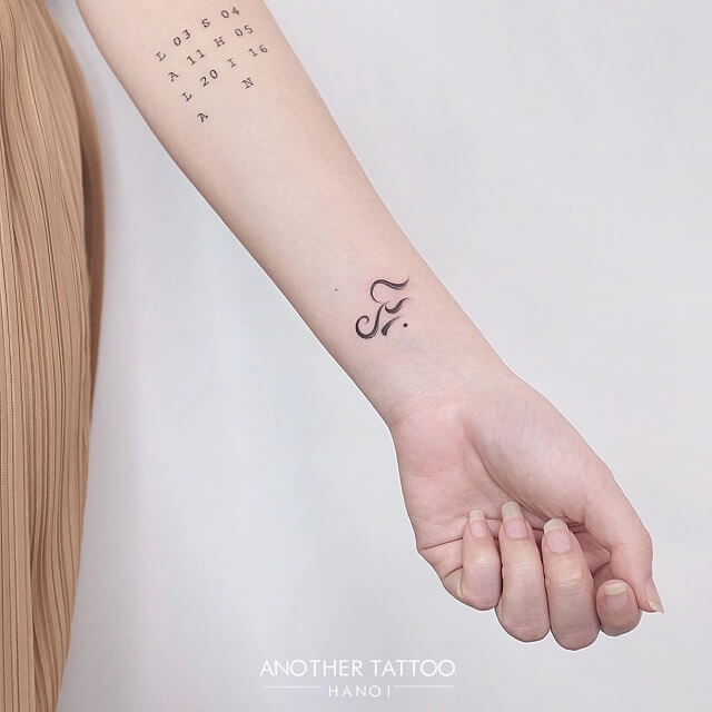 female inner wrist tattoo