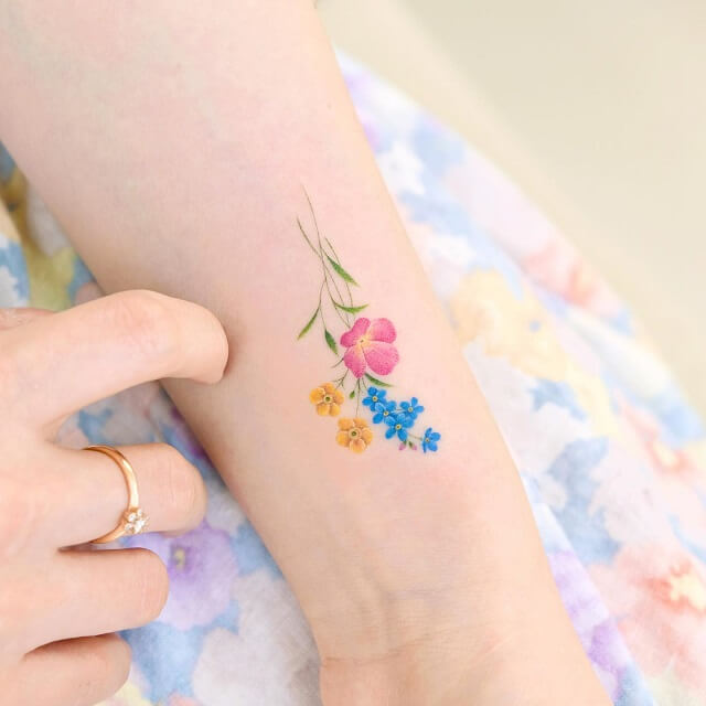 25 Flowers Tattoos On Wrists