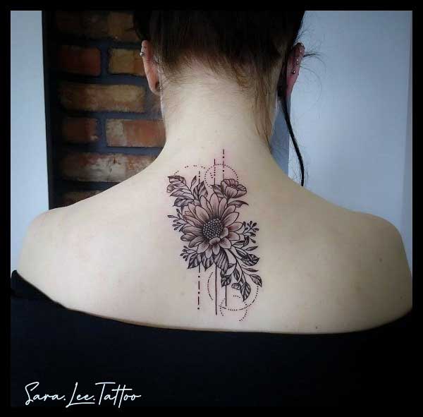 feminine upper back tattoos