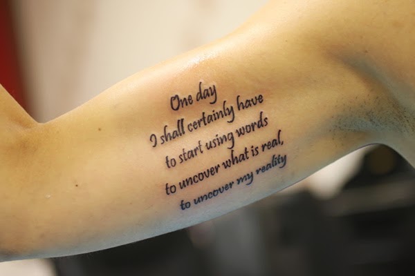 inner bicep quote tattoo