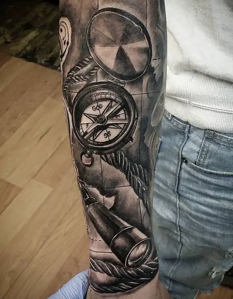 Tattoo of Compasses Maps Feathers