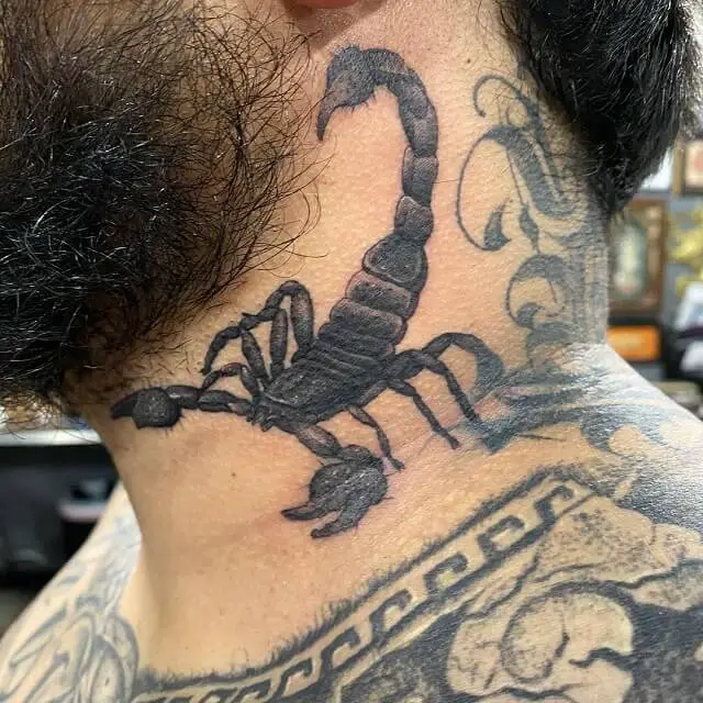 neck scorpion tattoo