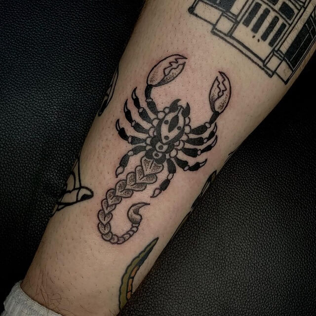 tribal and scorpion tattoo