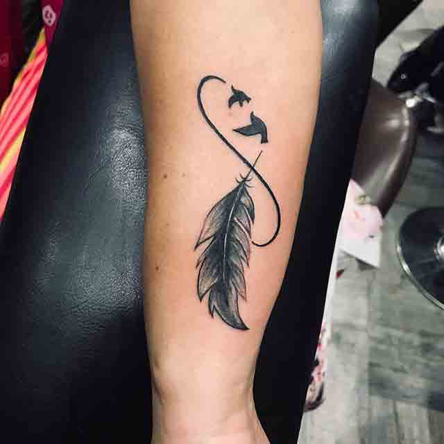 Infinity feather with name tattoo  wwwyantratattooscom yantratattoos  9444227772   infinitytattoo feathertattoo forearmtattoos  Instagram