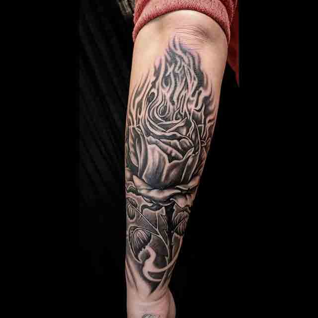Colorful 3D Fire And Flame Tattoo On Man Half Sleeve