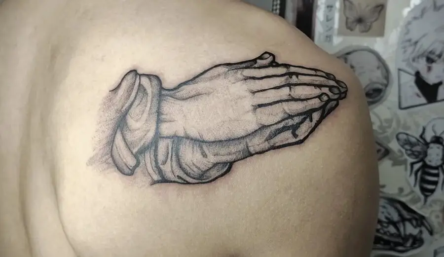 4. Black and Grey Praying Hands Tattoo on Shoulder - wide 2