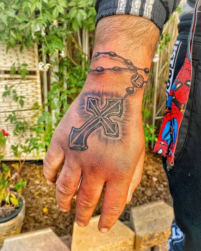 cross hand tattoos