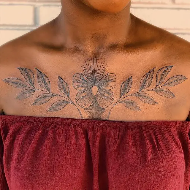 feminine chest tattoos