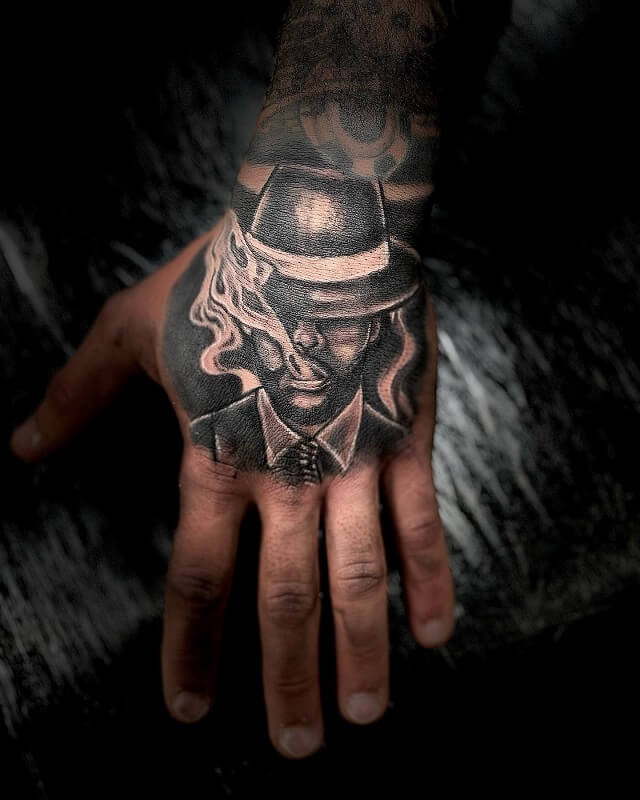 gangster hand tattoos