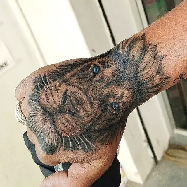 lion hand tattoos