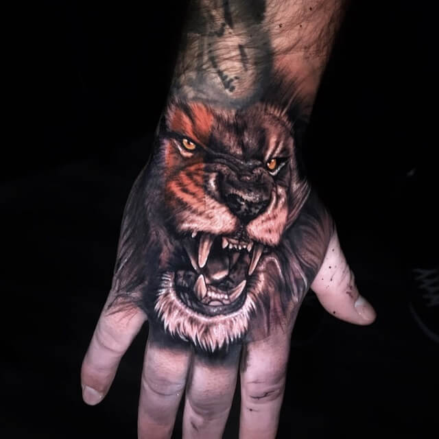 lion hand tattoos