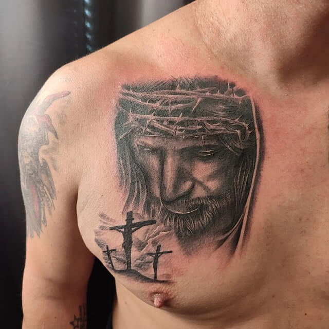 religious chest tattoos