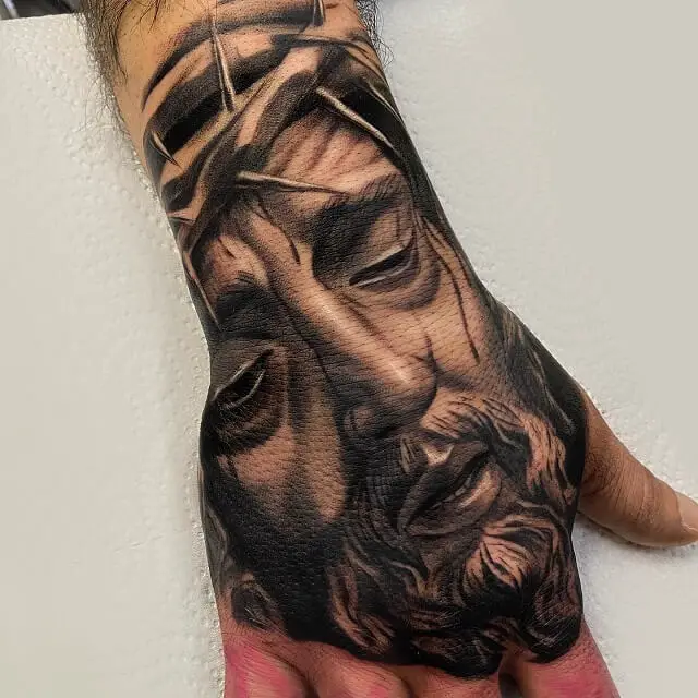 religious hand tattoos