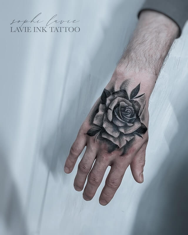 rose tattoos on hand