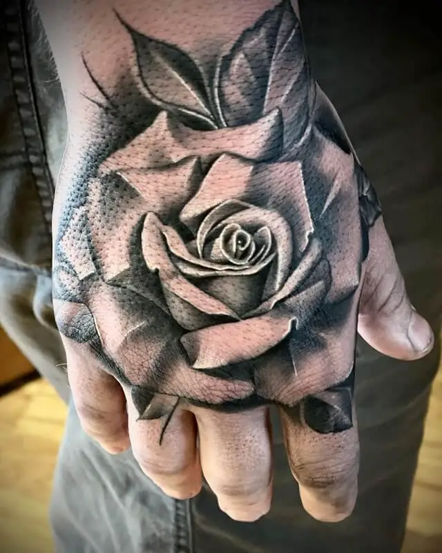 rose tattoos on hand