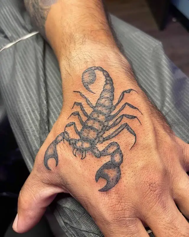 scorpion hand tattoos