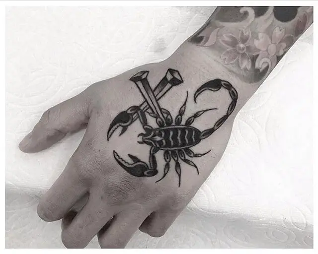 scorpion hand tattoos