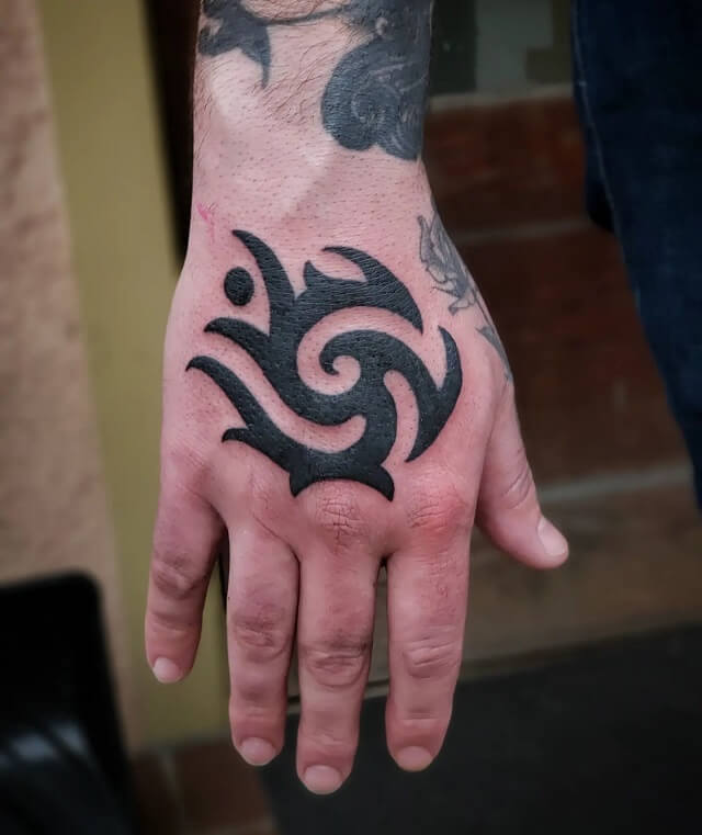 hand tattoos for men tribal