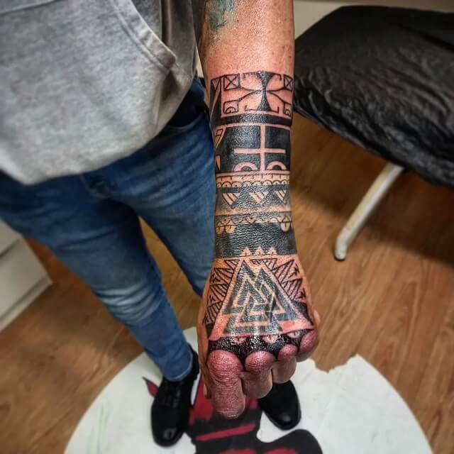 tribal hand tattoos